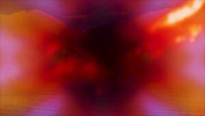 A psychedelic, energetic image of rich pinks and deep hues mixing together